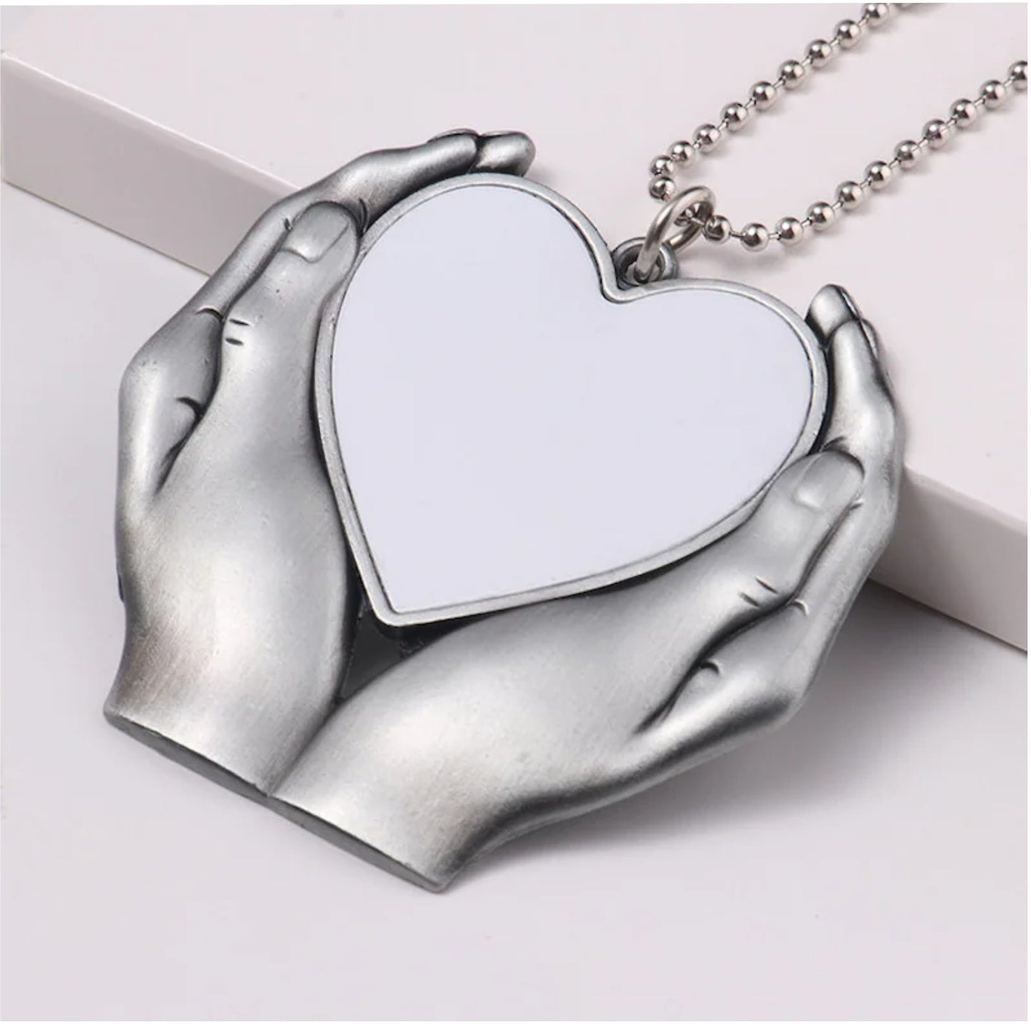 IN THE PALM OF YOUR HANDS HEART PENDANT